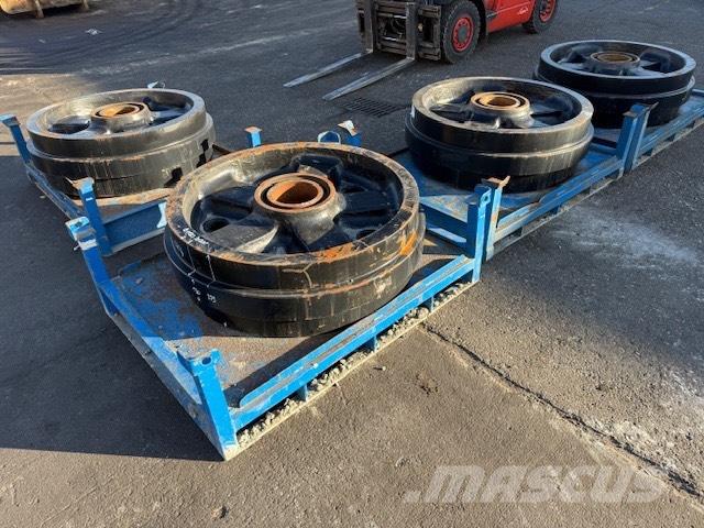 CAT 6020 NEW IDLER Sliedes, ķēdes un šasija