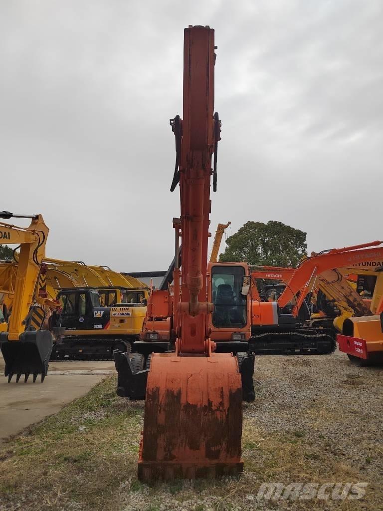Doosan DH 210 W-7 Ekskavatori uz riteņiem