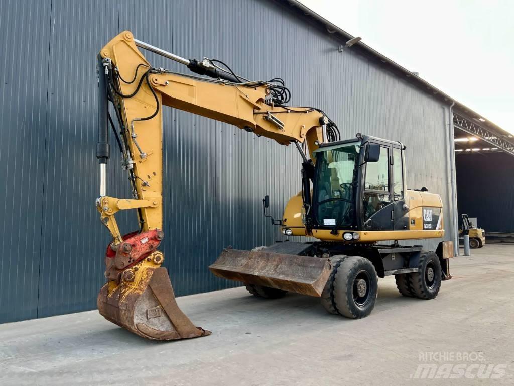 CAT M315D Ekskavatori uz riteņiem