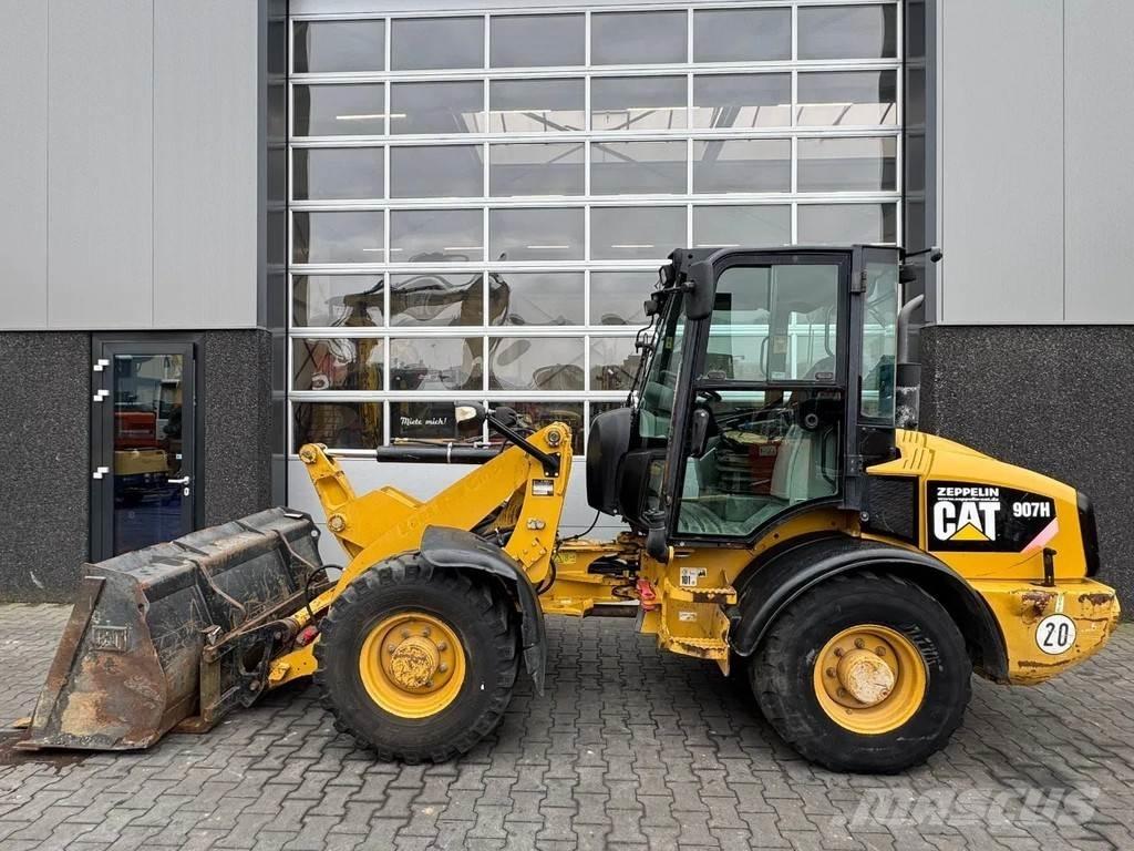 CAT 907H Iekrāvēji uz riteņiem