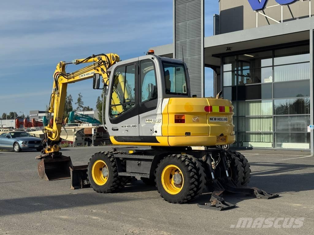 New Holland MH 2.6 Ekskavatori uz riteņiem