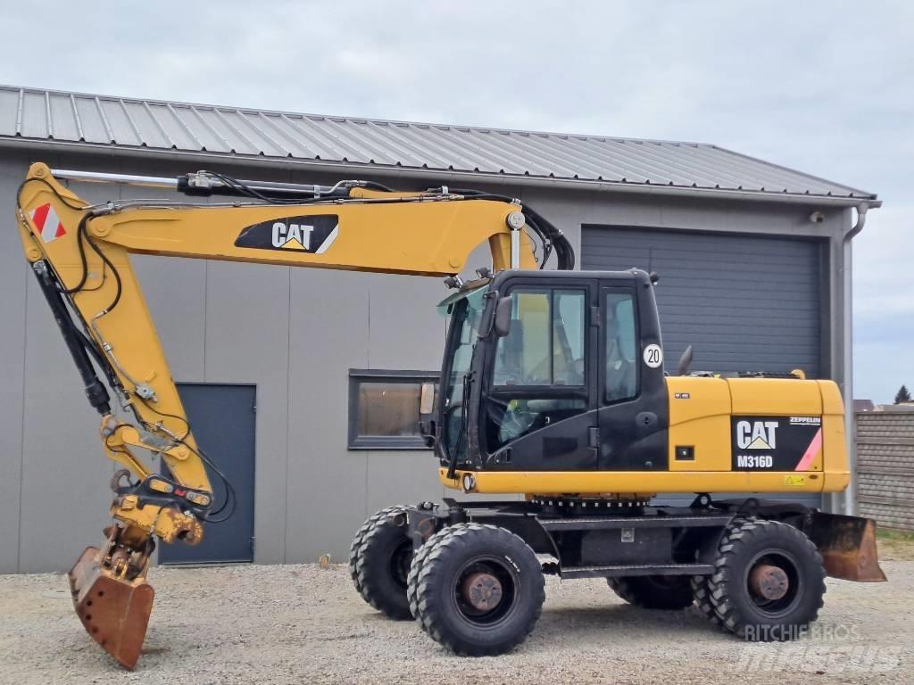 CAT M 316 D Ekskavatori uz riteņiem