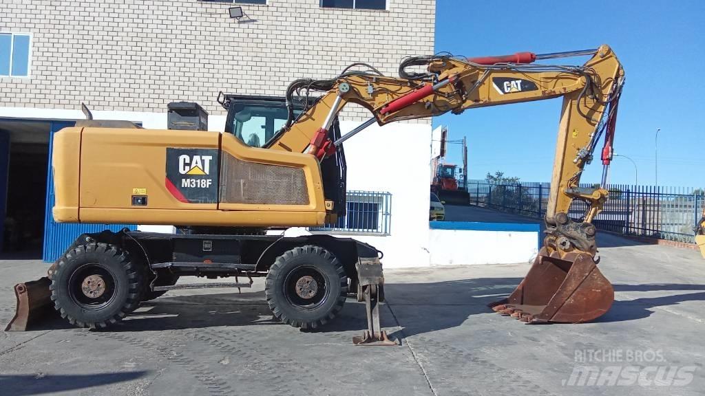 CAT M318F Ekskavatori uz riteņiem