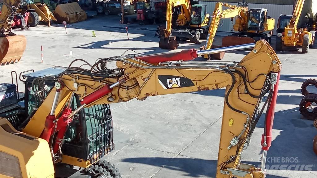 CAT M318F Ekskavatori uz riteņiem