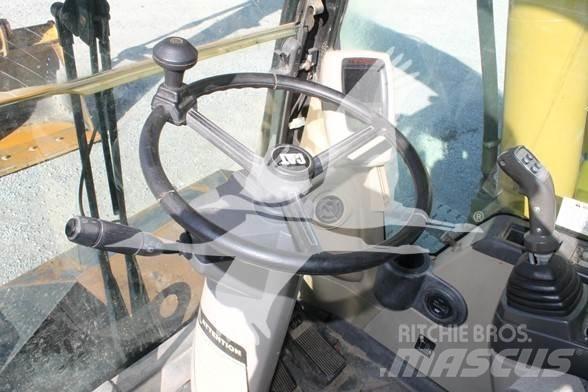 CAT M318C Ekskavatori uz riteņiem