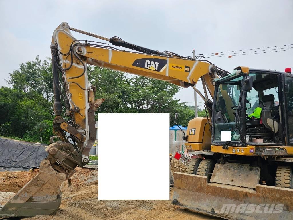 CAT 314F Ekskavatori uz riteņiem