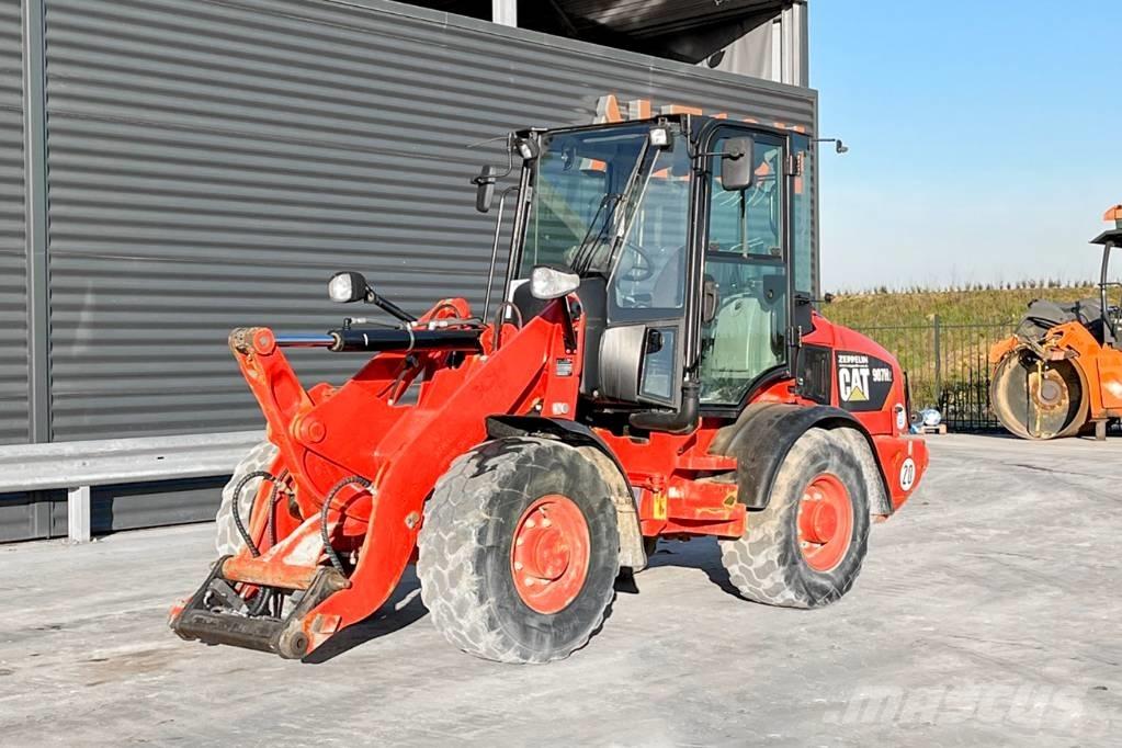 CAT 907H2 Iekrāvēji uz riteņiem