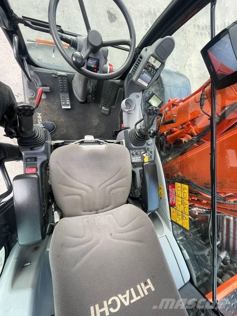 Hitachi 140W Ekskavatori uz riteņiem