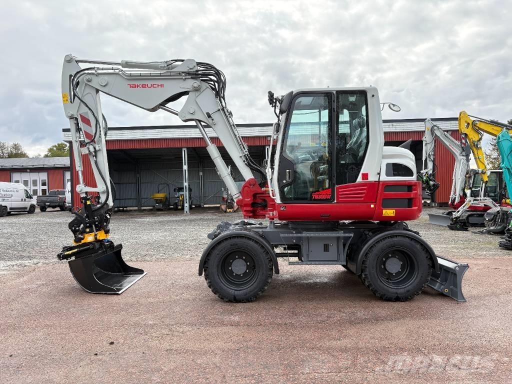Takeuchi TB395W Ekskavatori uz riteņiem