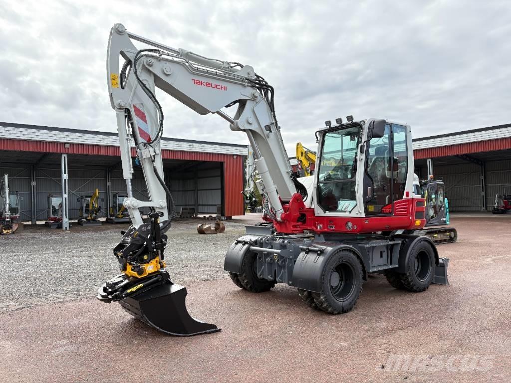 Takeuchi TB395W Ekskavatori uz riteņiem