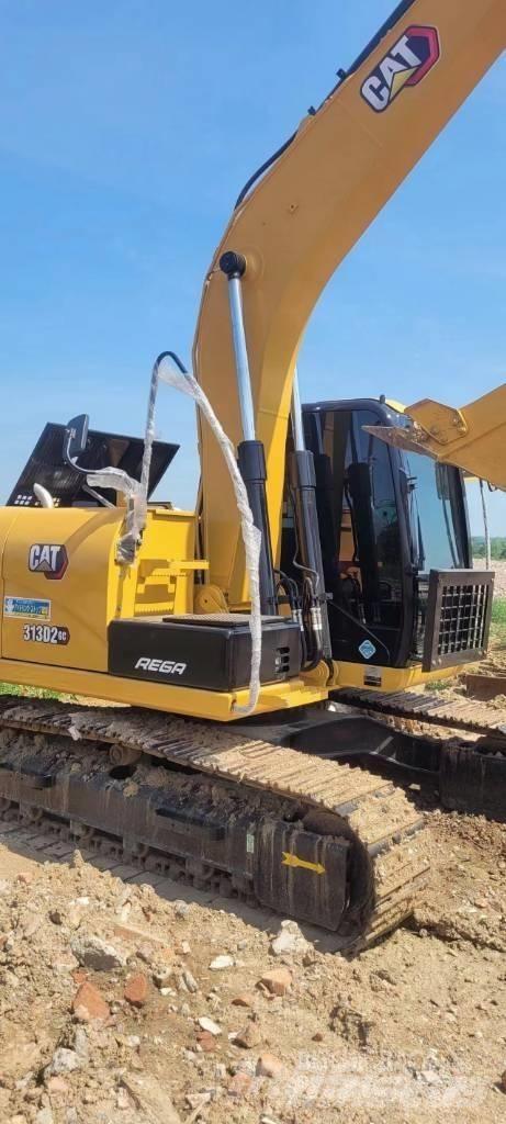 CAT 313 Vidēja lieluma ekskavatori 7 t - 12 t