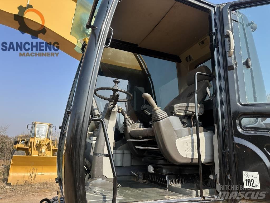 CAT M320D Ekskavatori uz riteņiem