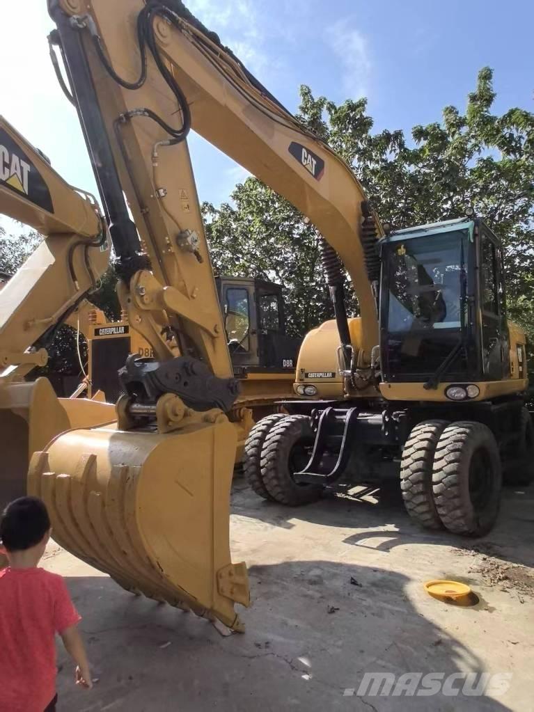 CAT 315 D Ekskavatori uz riteņiem