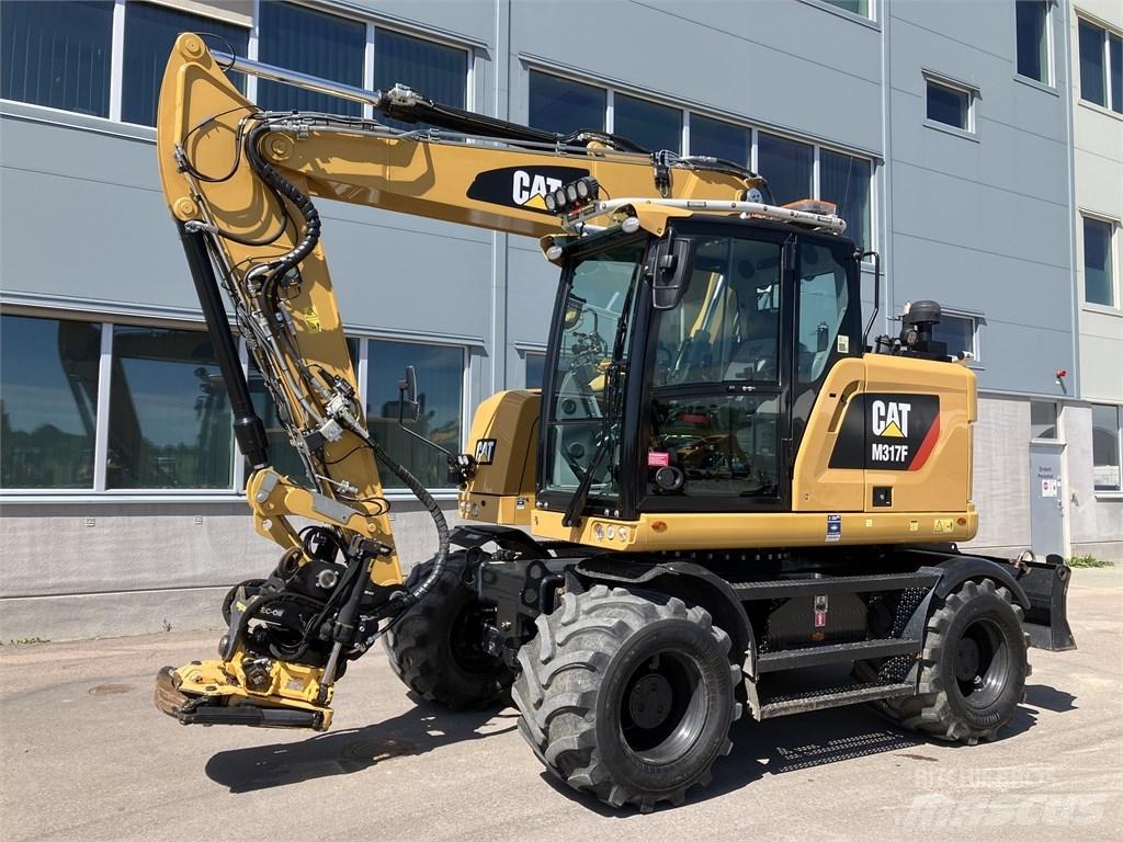 CAT 317 F Ekskavatori uz riteņiem