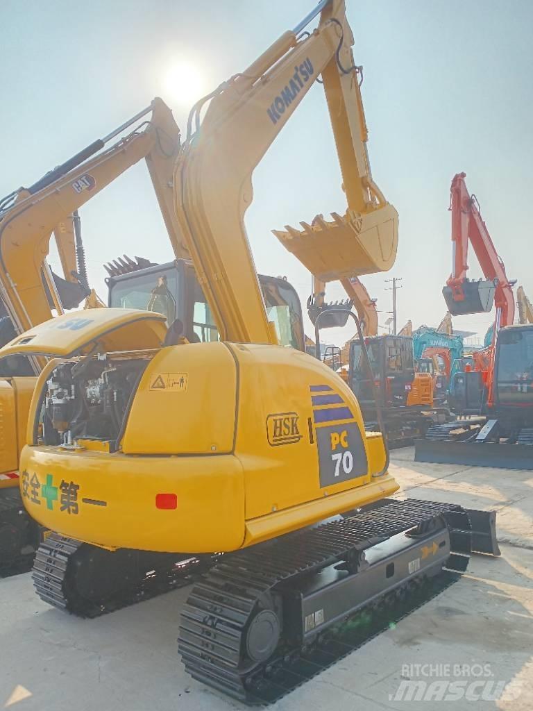 Komatsu PC70 Vidēja lieluma ekskavatori 7 t - 12 t
