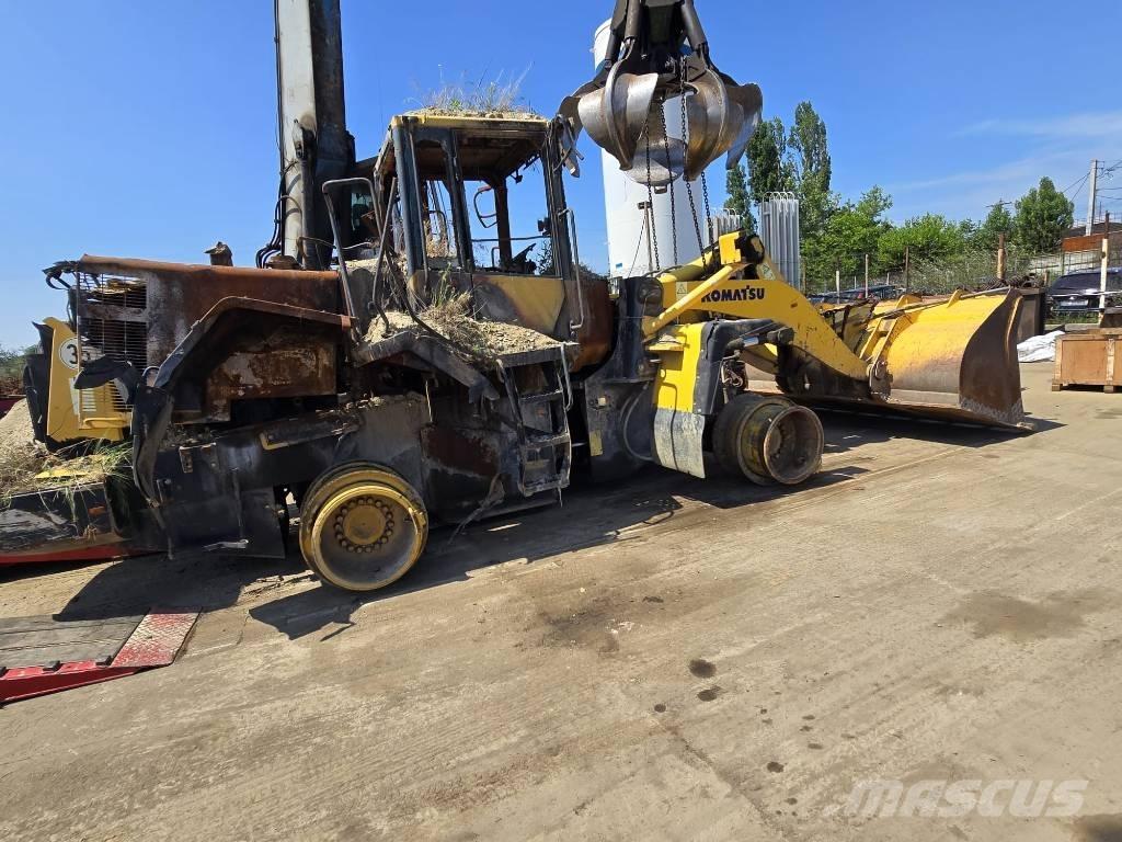Komatsu 380-6 Strēles un kausi