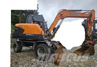 Doosan DX65W Ekskavatori uz riteņiem