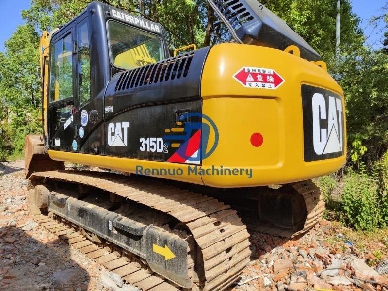 CAT 315D2 Vidēja lieluma ekskavatori 7 t - 12 t