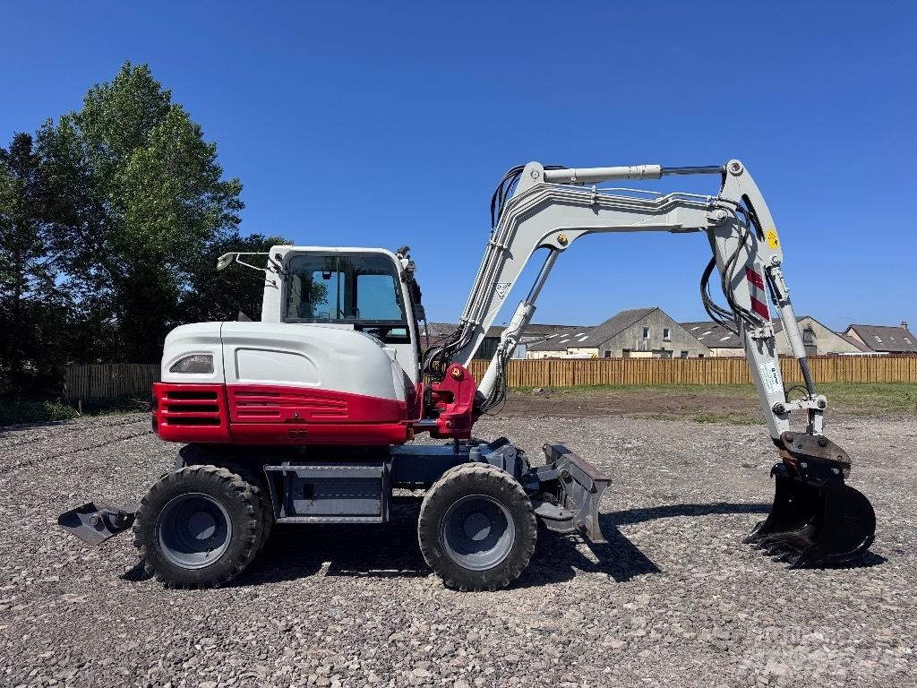 Takeuchi TB 295 W Ekskavatori uz riteņiem