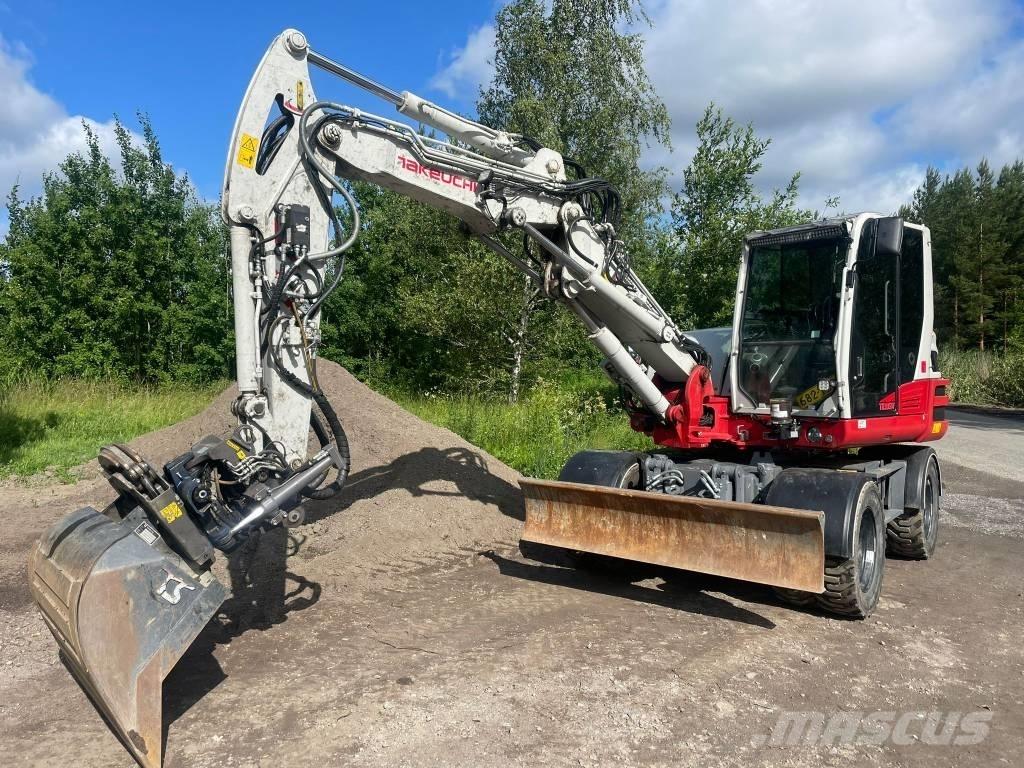 Takeuchi TB395W Ekskavatori uz riteņiem