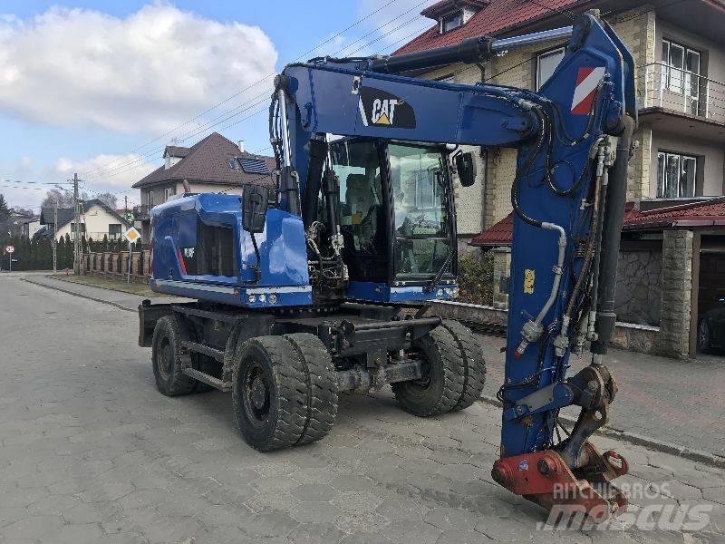 CAT M318f 318 f Ekskavatori uz riteņiem