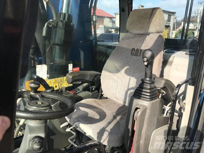 CAT M318f 318 f Ekskavatori uz riteņiem