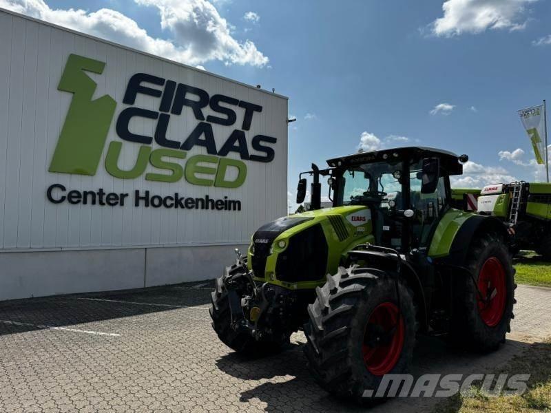 CLAAS AXION 830 Traktori
