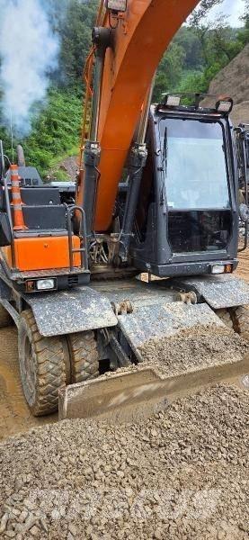 Doosan D 140W-5 Ekskavatori uz riteņiem