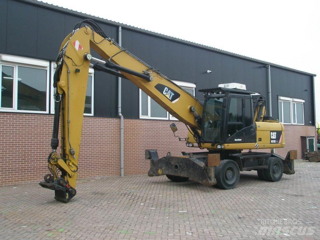 CAT M318D Ekskavatori uz riteņiem