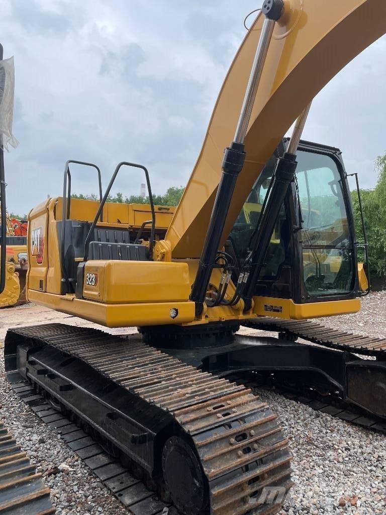 CAT 323GX Vidēja lieluma ekskavatori 7 t - 12 t