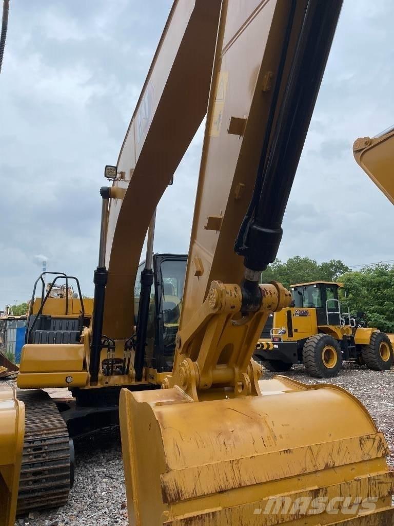 CAT 323GX Vidēja lieluma ekskavatori 7 t - 12 t