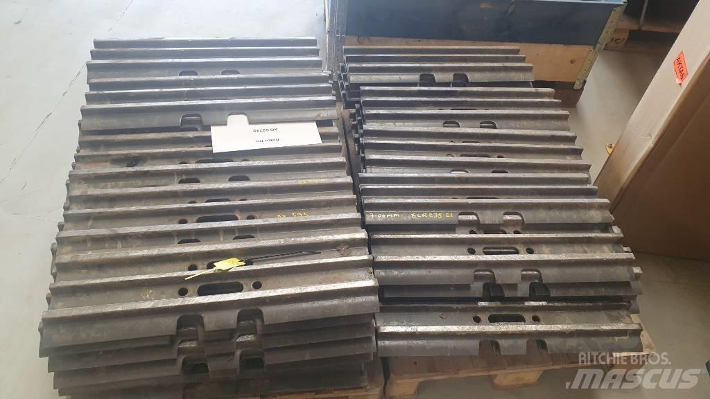 Volvo Skoplader Sliedes, ķēdes un šasija