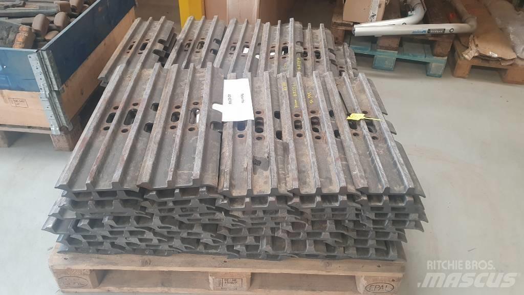 Volvo Skoplader Sliedes, ķēdes un šasija