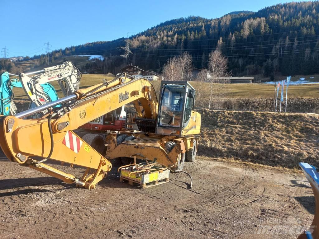 CASE 210WX Ekskavatori uz riteņiem