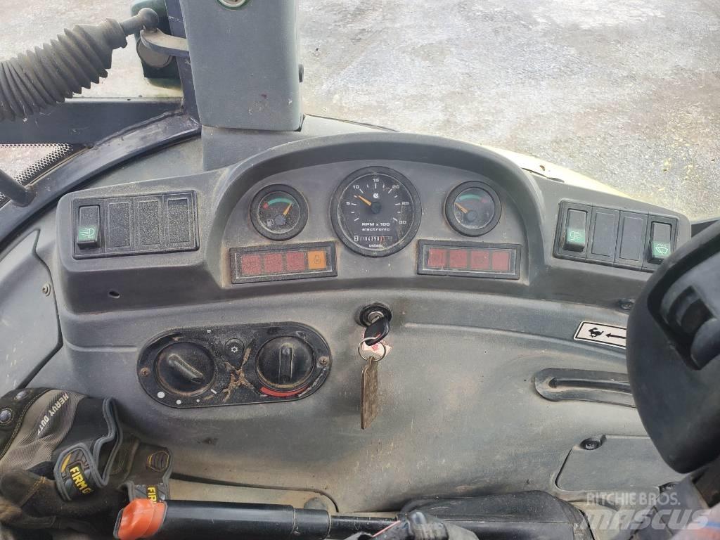 New Holland LB 75 Ekskavatori uz riteņiem