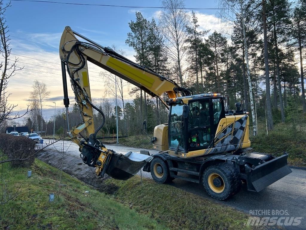 CAT M 317F Ekskavatori uz riteņiem