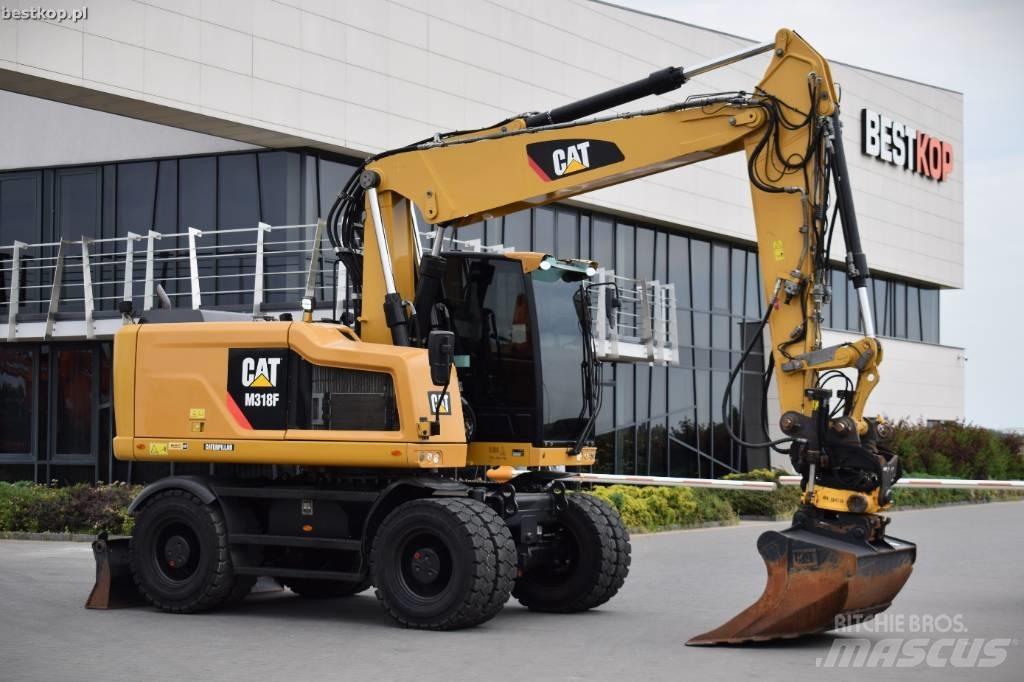 CAT M 318 F Ekskavatori uz riteņiem