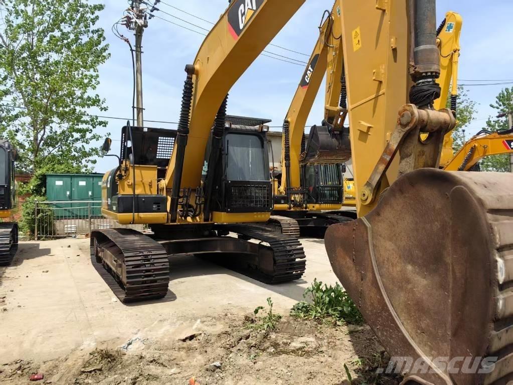 CAT 323 D Kāpurķēžu ekskavatori