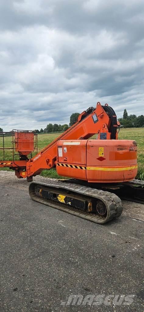 Hitachi HX99B Strēles pacēlāji