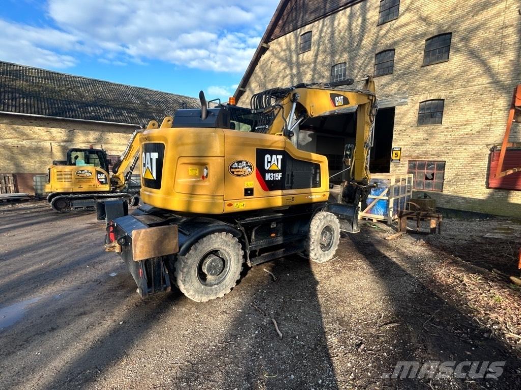 CAT M315F Ekskavatori uz riteņiem