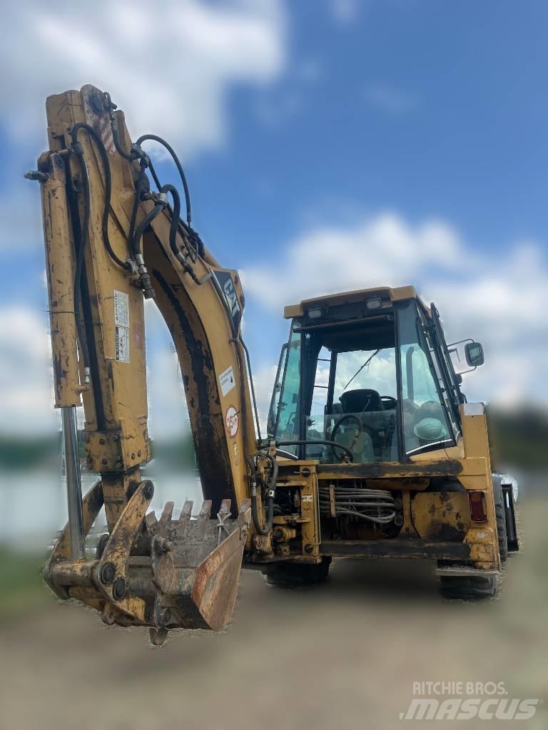 CAT 428 Ekskavatori-iekrāvēji