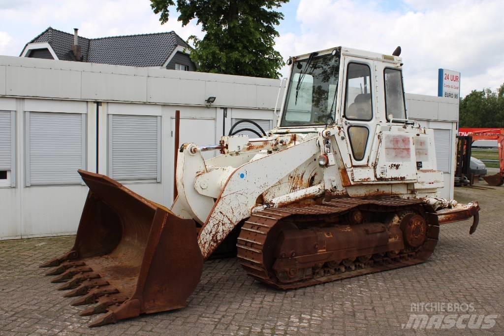 CAT 953 Kāpurķēžu iekrāvēji