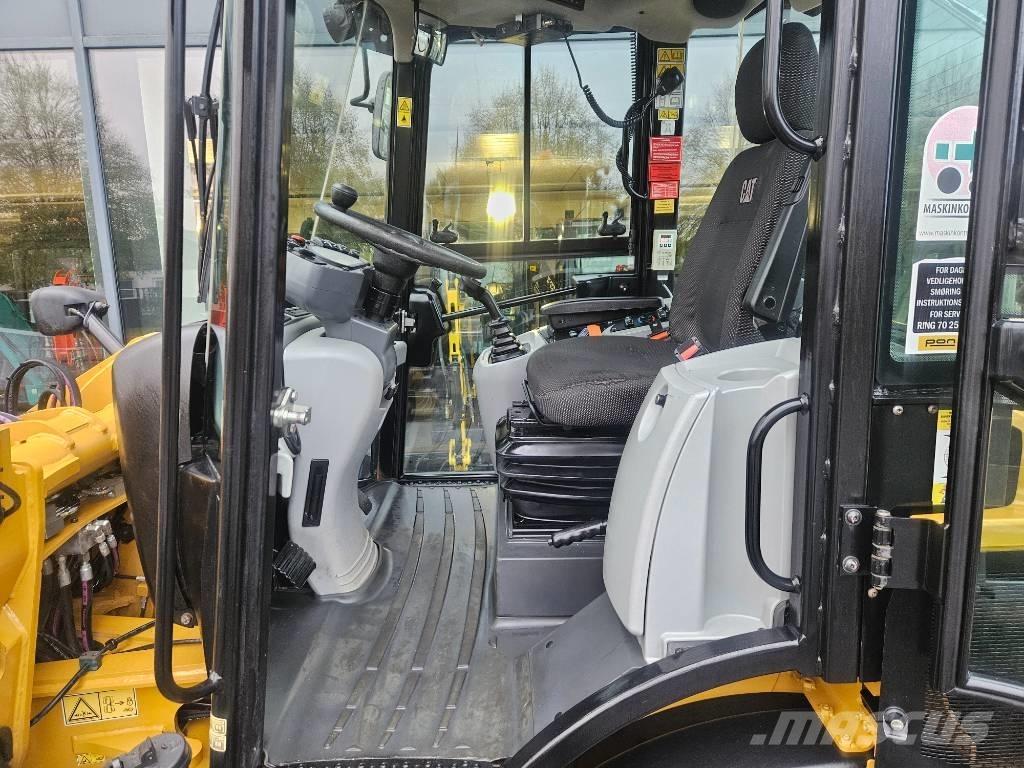 CAT 908m Iekrāvēji uz riteņiem