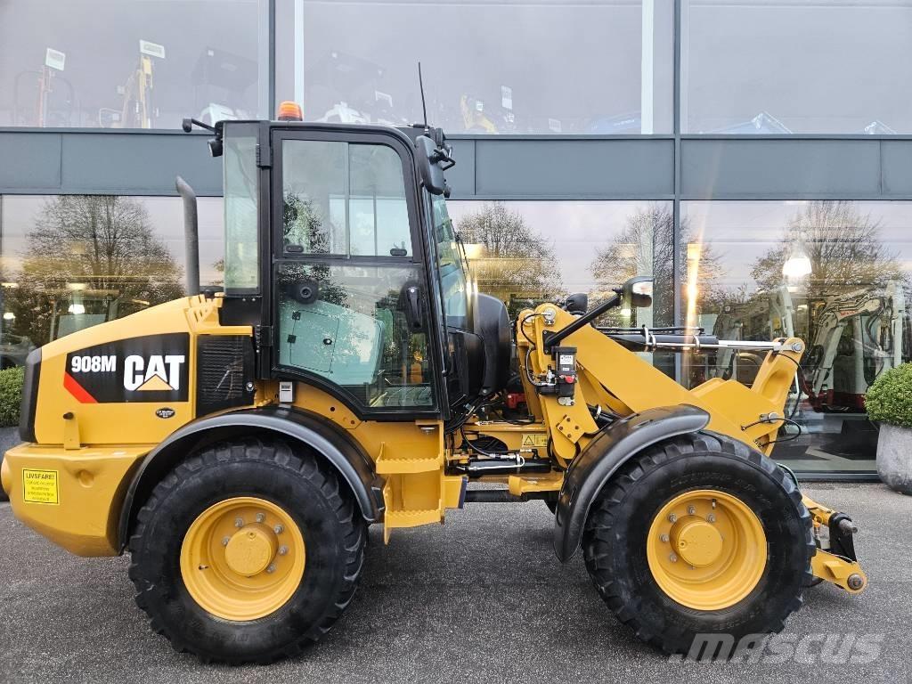 CAT 908m Iekrāvēji uz riteņiem