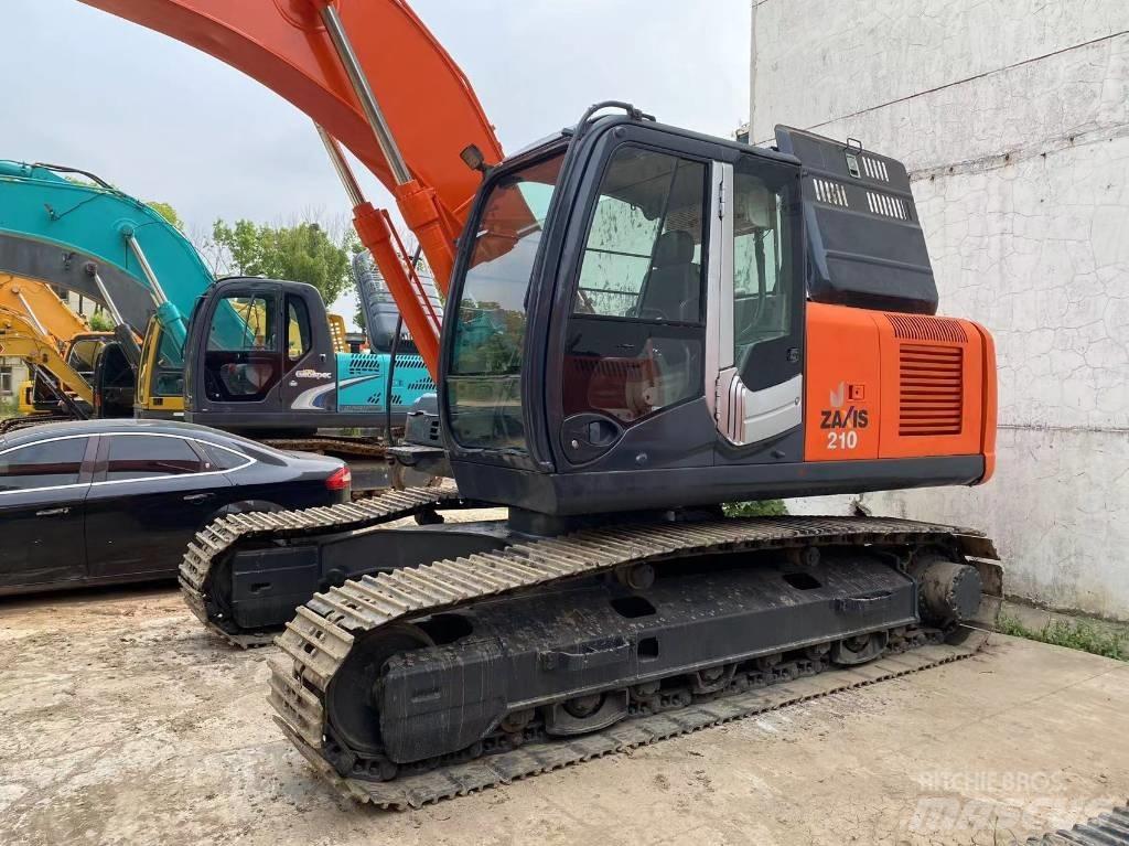 Hitachi ZX 210 Kāpurķēžu ekskavatori