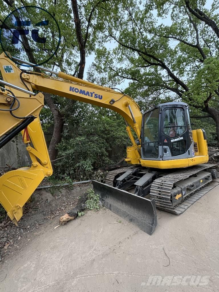 Komatsu 128 Kāpurķēžu ekskavatori