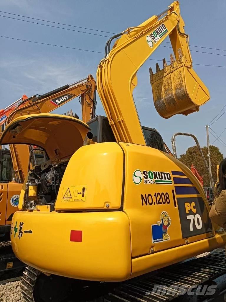 Komatsu PC 70 Vidēja lieluma ekskavatori 7 t - 12 t