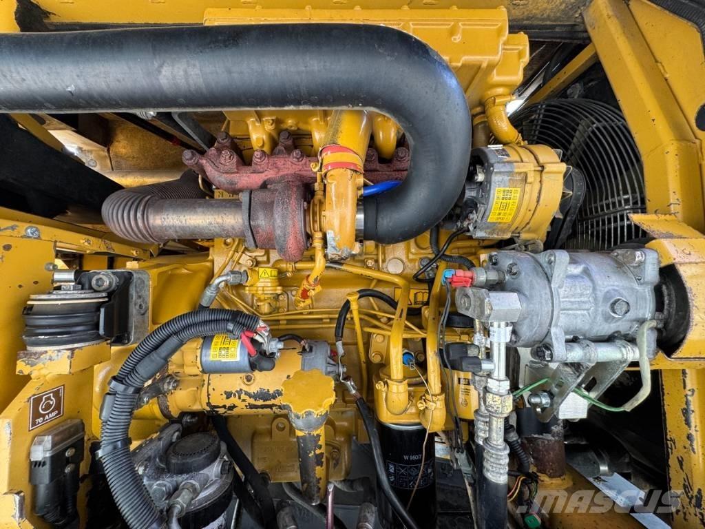 CAT M 315 Ekskavatori uz riteņiem