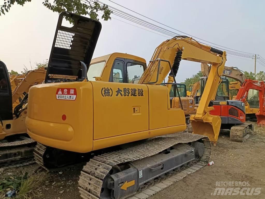 Komatsu PC120 Vidēja lieluma ekskavatori 7 t - 12 t