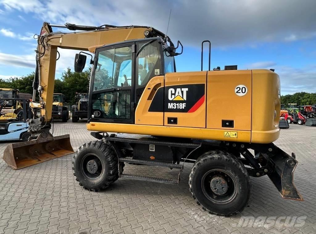 CAT M 318 F Ekskavatori uz riteņiem